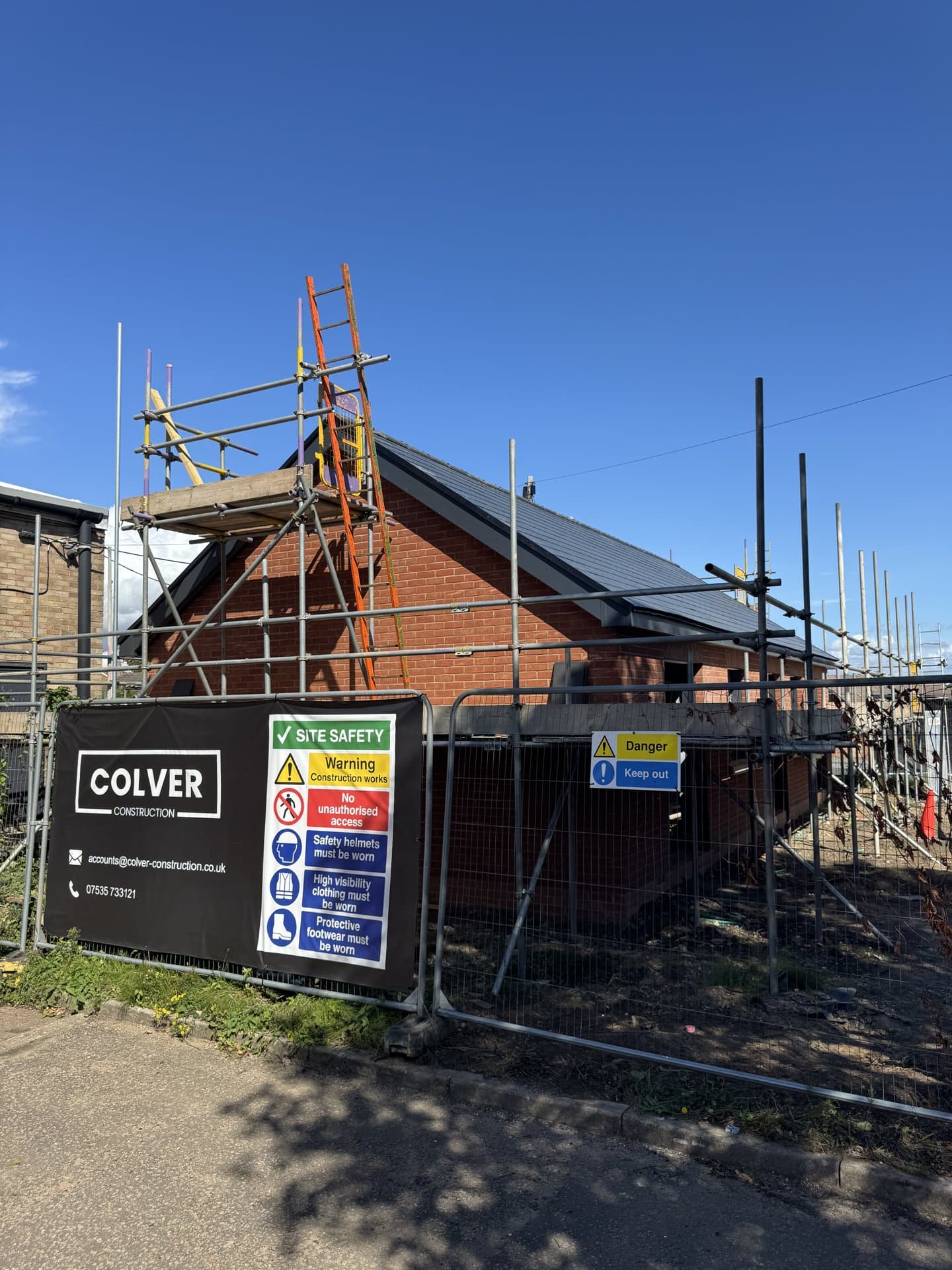 Scaffolded new-build bungalow under construction by Colver Construction in Fareham