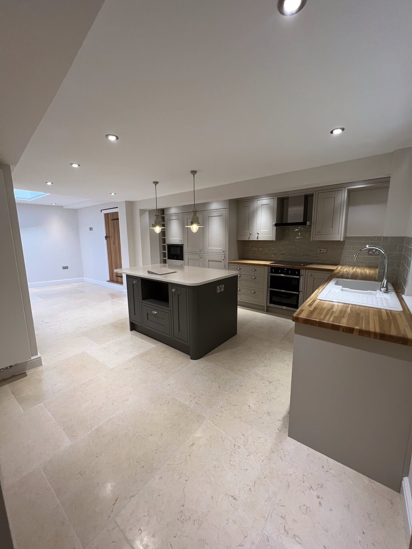 Newly fitted Shaker kitchen with bespoke island, en-suite off the kitchen and new flooring